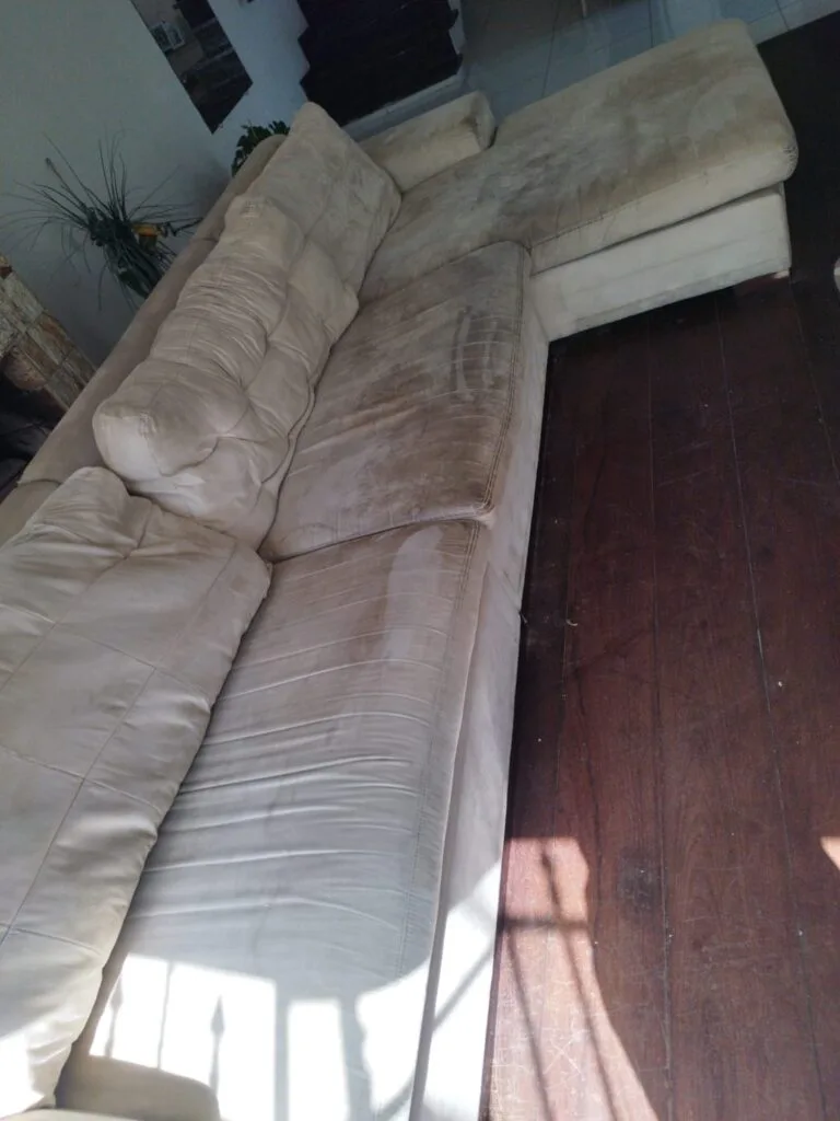 sofa l sujo